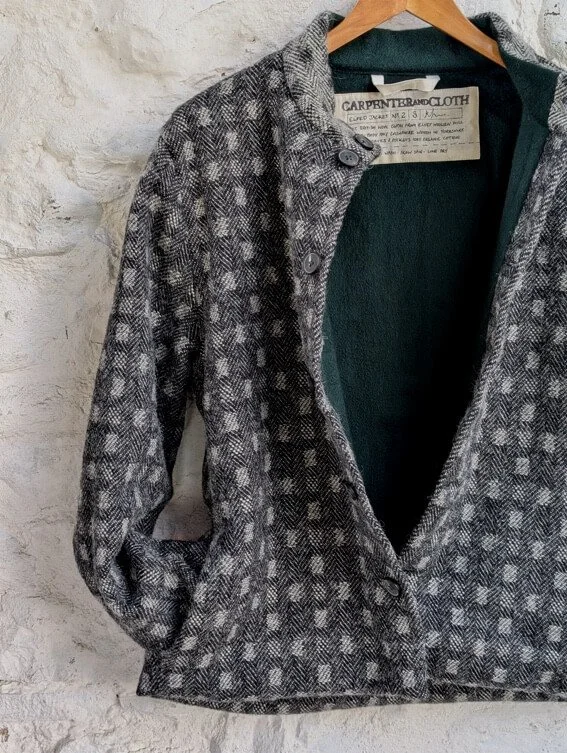 Welsh tweed jacket showing the green cashmere lining